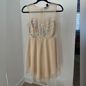 Light pink dress with see through back and heart shape in front